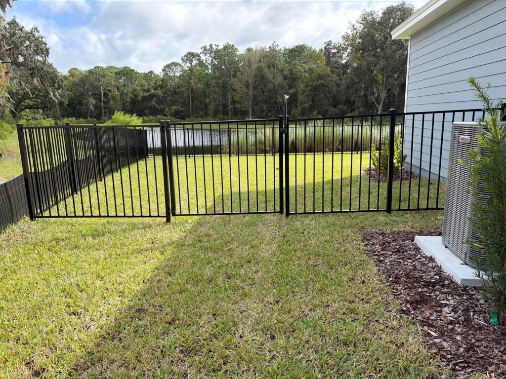 Aluminum fence installed by Fortera Fencing