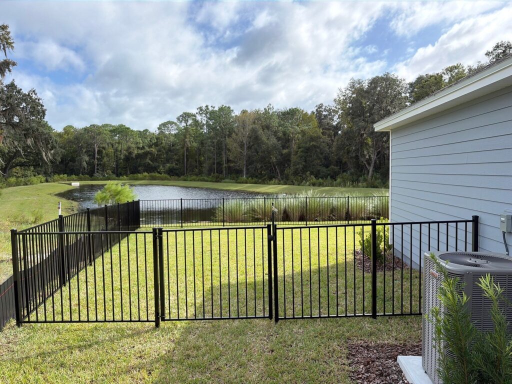 Aluminum fence installed by Fortera Fencing