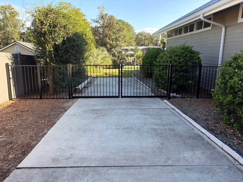 Aluminum fence installed by Fortera Fencing