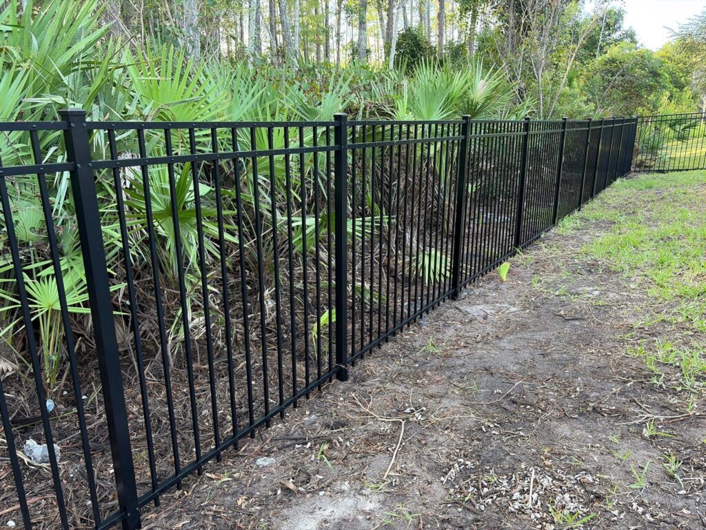 Aluminum fence installed by Fortera Fencing