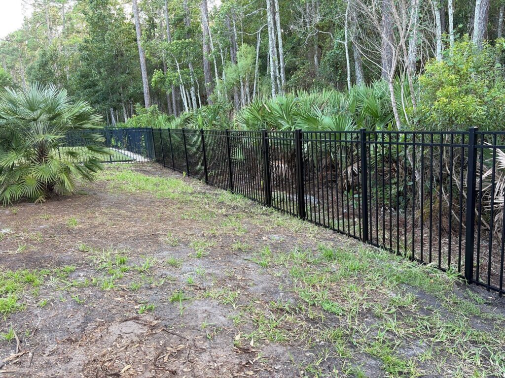 Aluminum fence installed by Fortera Fencing