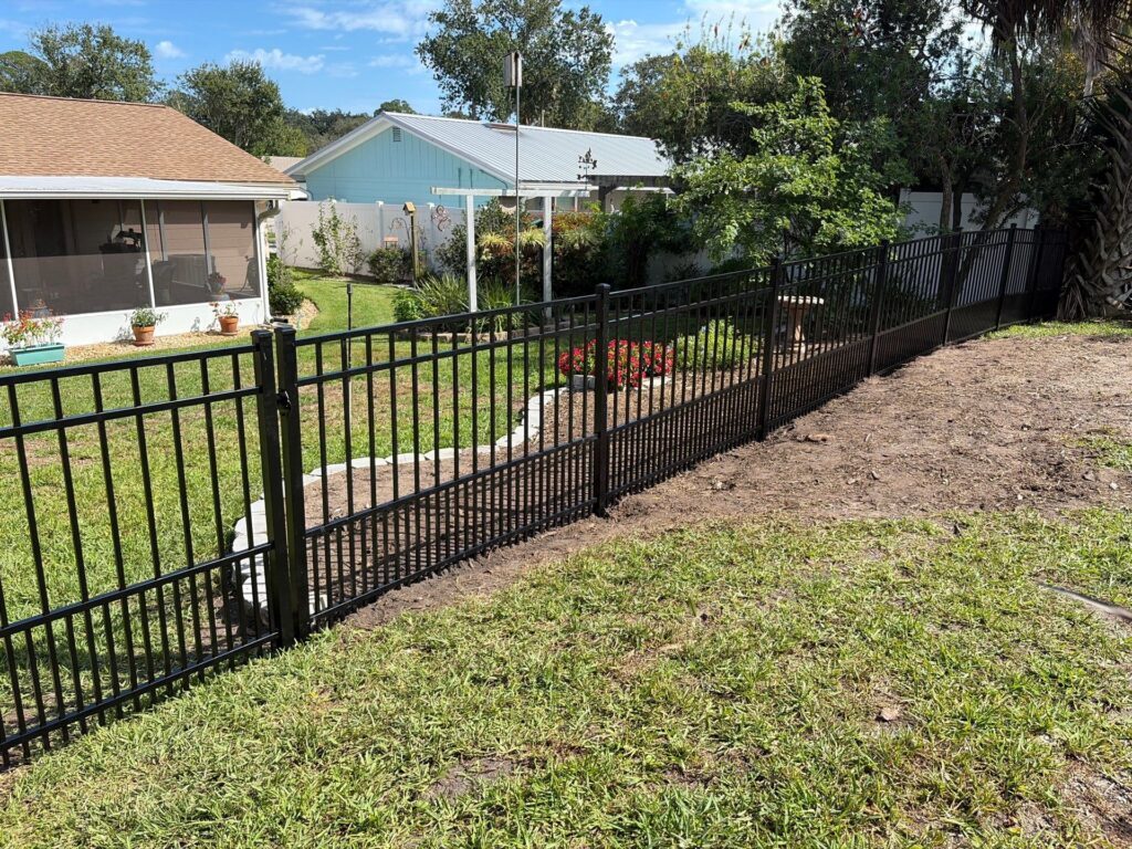 Aluminum fence installed by Fortera Fencing
