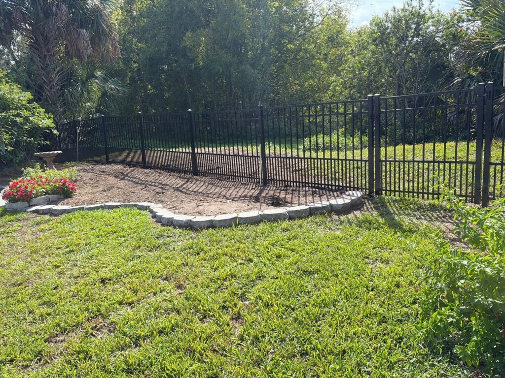 Aluminum fence installed by Fortera Fencing