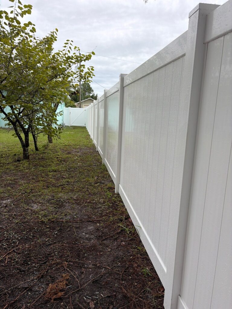 Vinyl fence installed by Fortera Fencing
