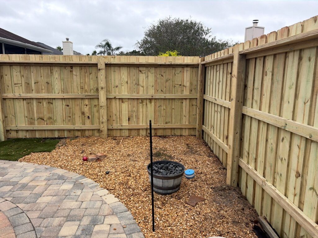 Wood fence installed by Fortera Fencing