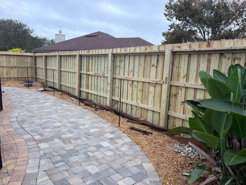 Wood fence installed by Fortera Fencing