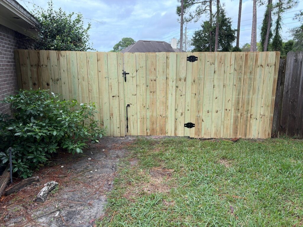 Wood fence installed by Fortera Fencing