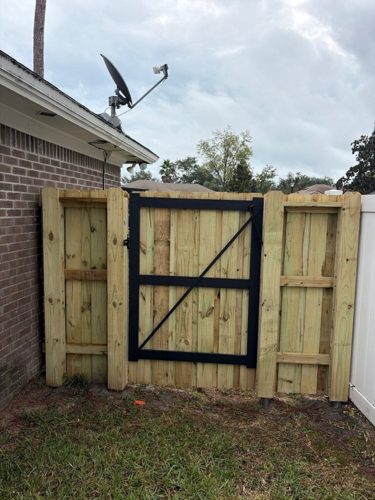 Wood fence installed by Fortera Fencing