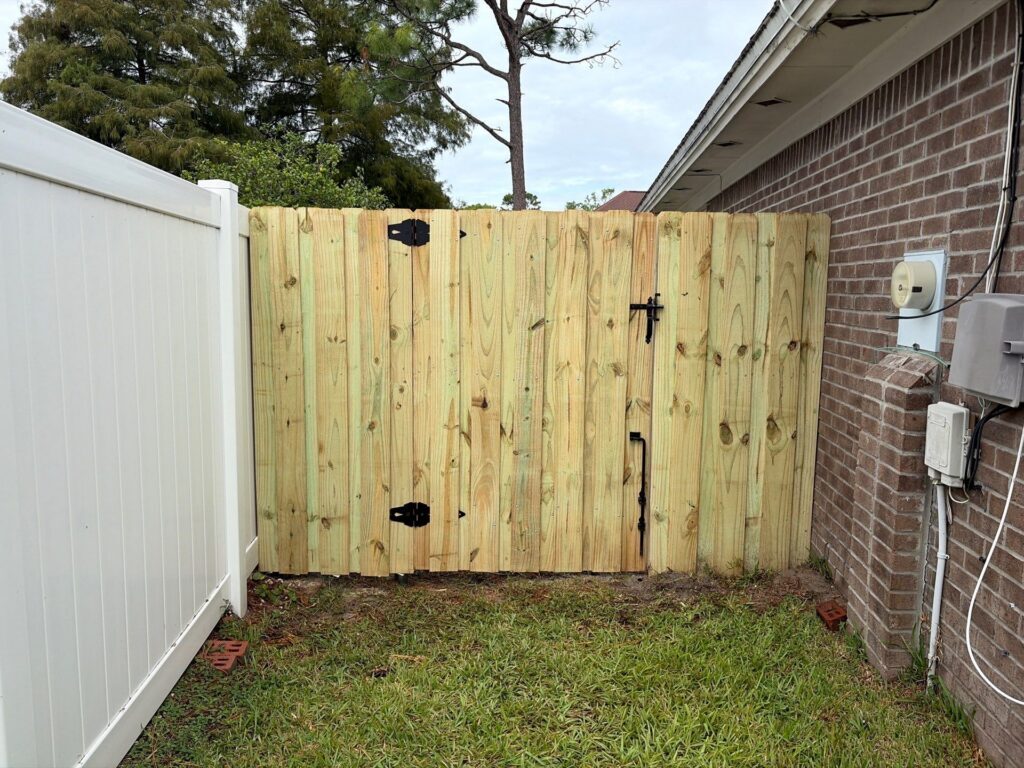 Wood fence installed by Fortera Fencing