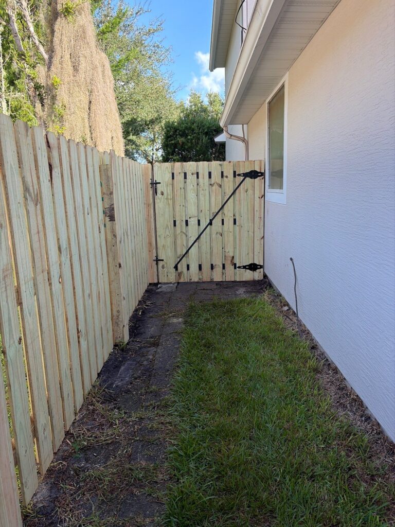 Wood fence installed by Fortera Fencing