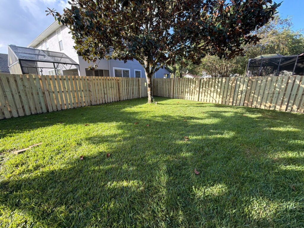 Wood fence installed by Fortera Fencing