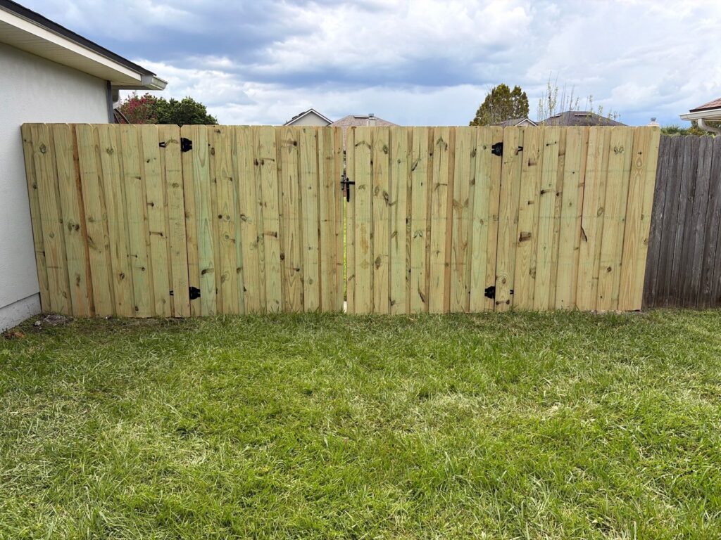 Wood fence installed by Fortera Fencing