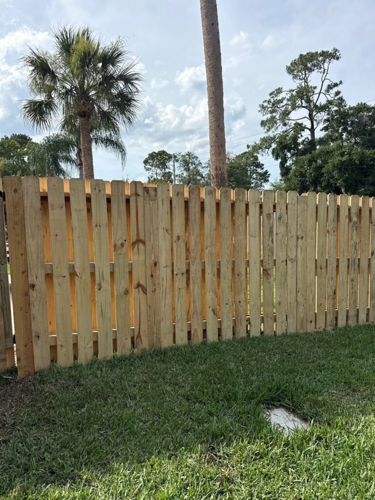 Wood fence installed by Fortera Fencing