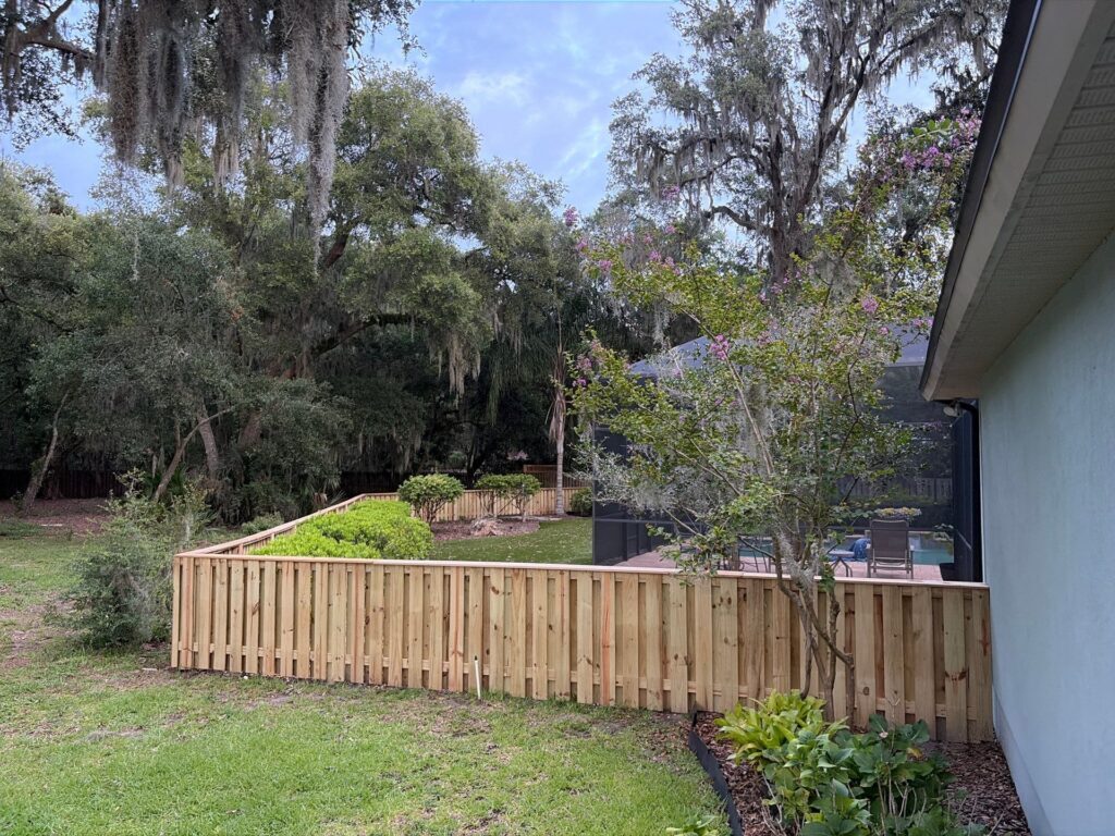 Wood fence installed by Fortera Fencing