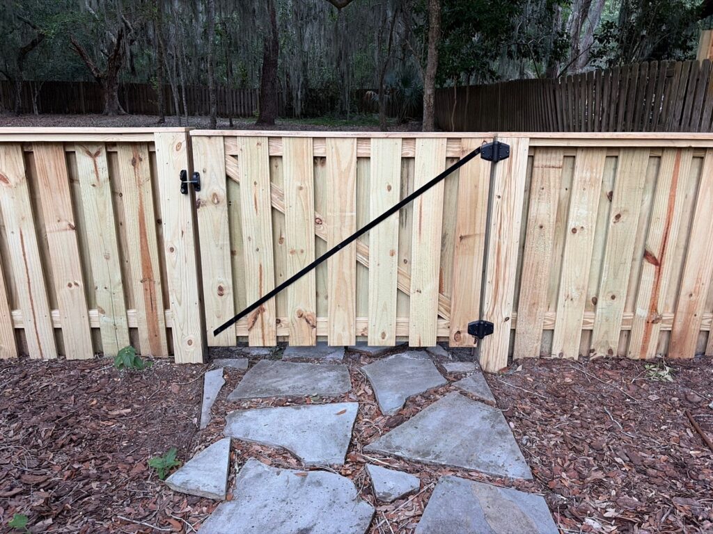 Wood fence installed by Fortera Fencing