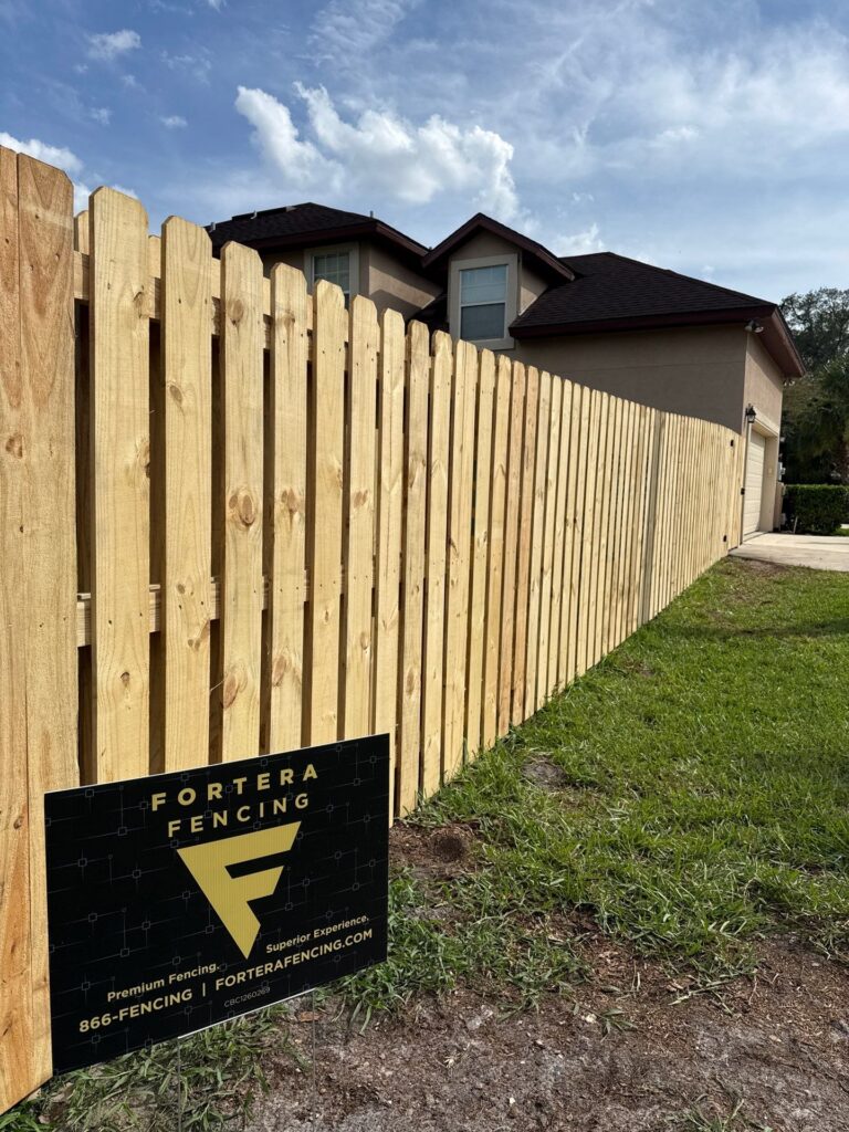 Wood fence installed by Fortera Fencing