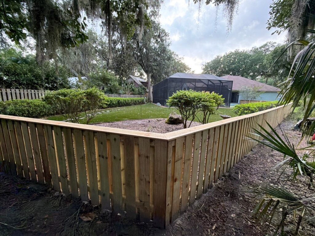 Wood fence installed by Fortera Fencing