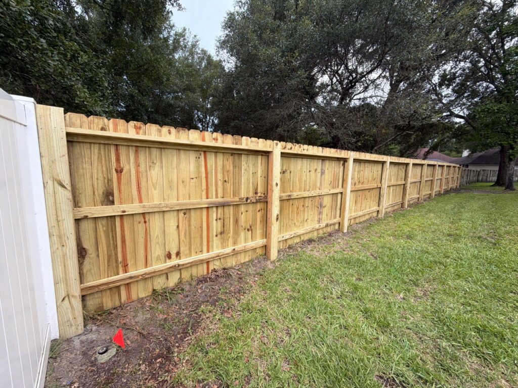 Wood fence installed by Fortera Fencing