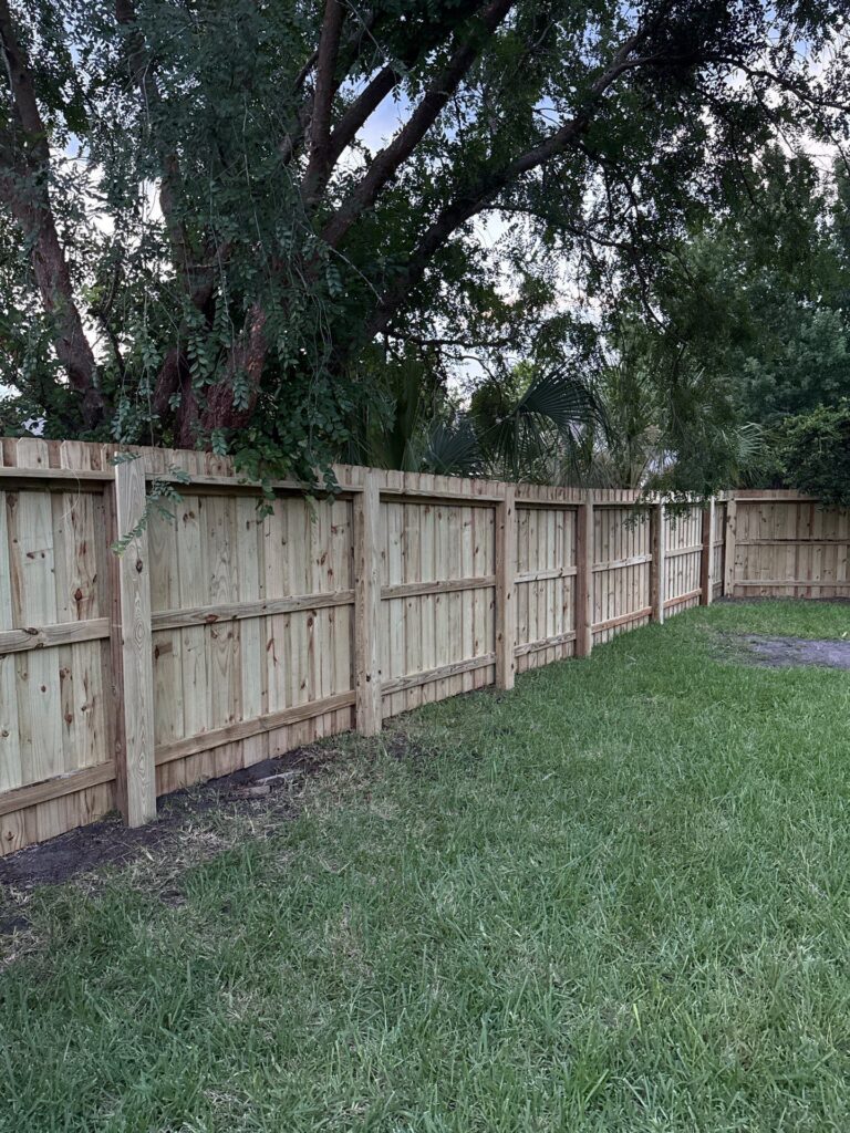 Wood fence installed by Fortera Fencing