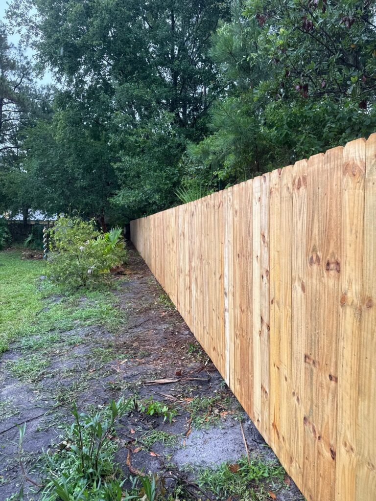 Wood fence installed by Fortera Fencing